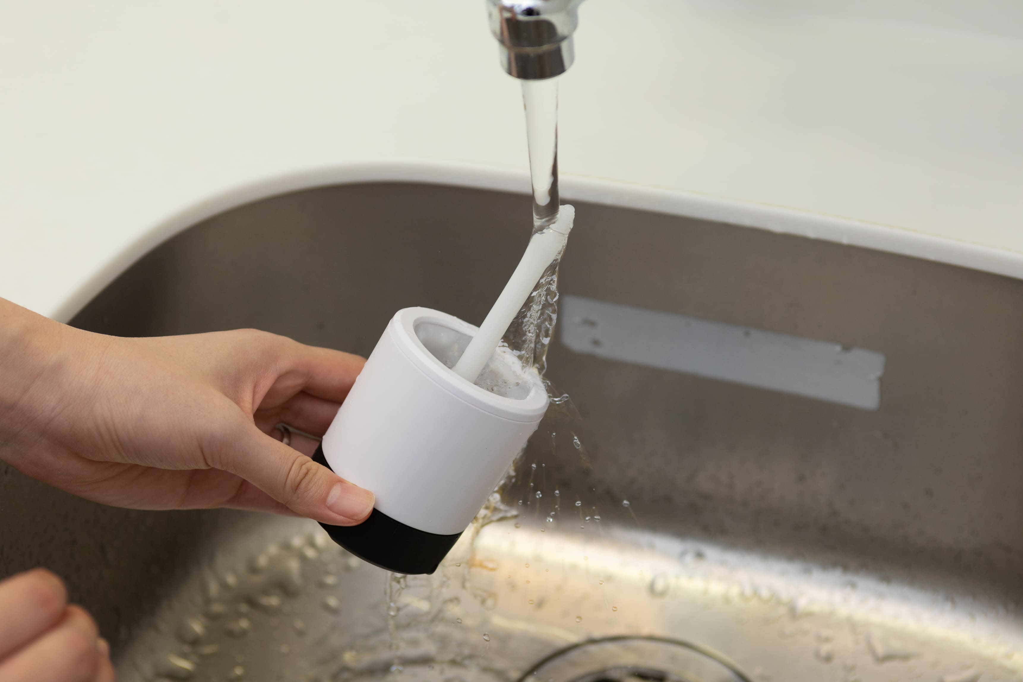 picture of cleaning drinkmate infuser in sink